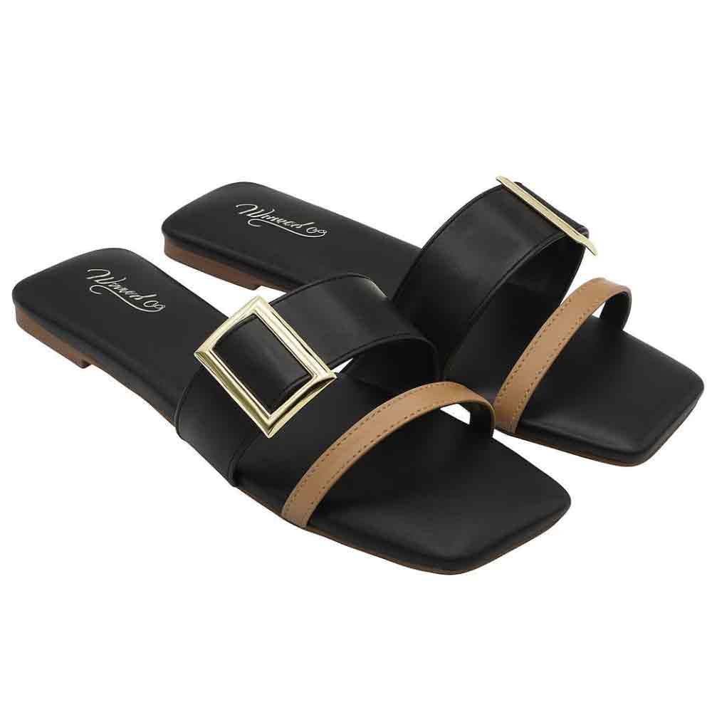 Black sandals with gold buckles on a white background