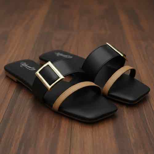 Side view of black Contrast Curve flats displaying modern sophistication