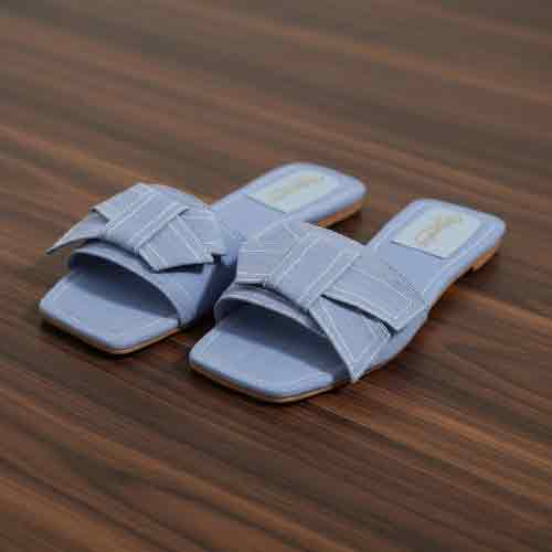 Side angle of blue Denim Cloud flats displaying comfortable sole