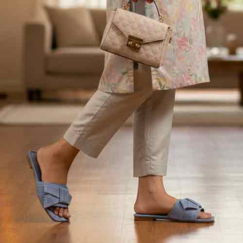 Top view of blue Denim Cloud flats highlighting casual elegance